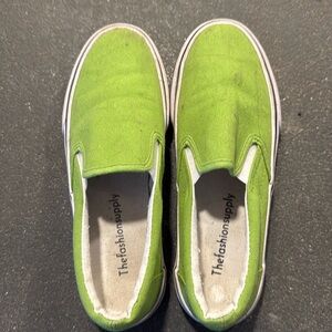 Bright green slip ons